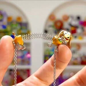 ⭐️NEW⭐️ Toy Story Slinky Dachshund Dog Pendant Necklace